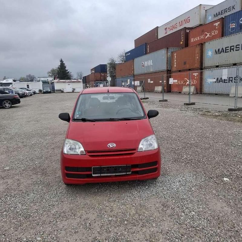 Gebraucht Daihatsu Cuore Plus 58 PS (42 kW) 2006 Rot Kleinwagen