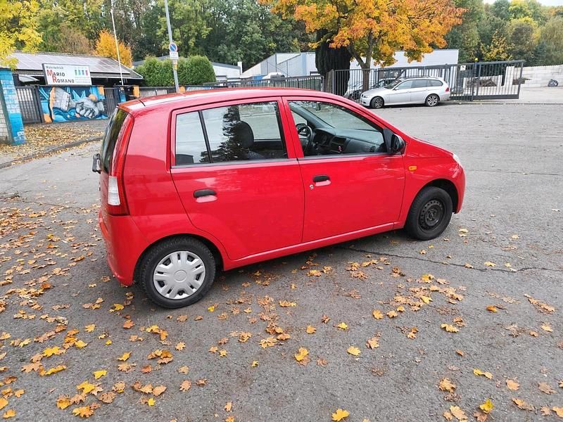 Gebraucht Daihatsu Cuore 58 PS (42 kW) 2003 Rot Kleinwagen