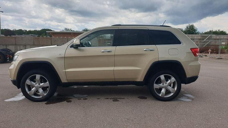 Gebraucht Jeep Grand Cherokee Overland 241 PS (177 kW) 2011 Gold SUV