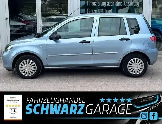 Używany Mazda 2 Comfort 202 KM (148 kW) 2004 Niebieski Hatchback