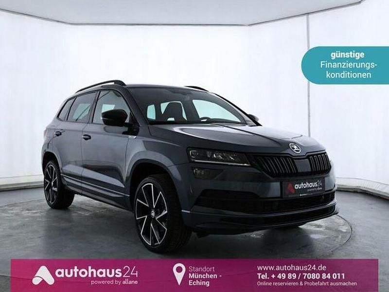 Grau Gebraucht 2021 Skoda Karoq SportLine SUV | 23.220 € (Guter Preis) - Bild 1/4