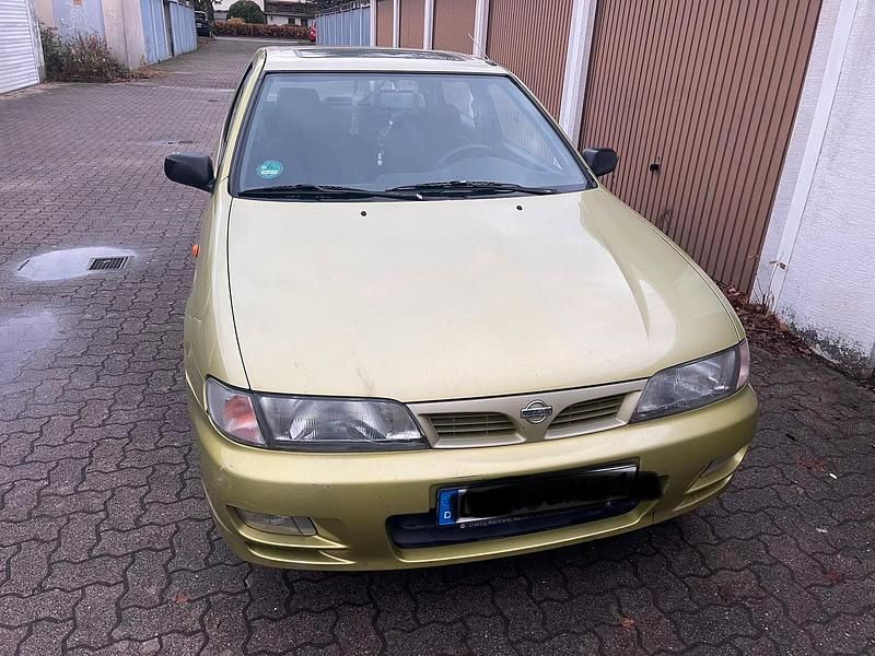 Gelb Gebraucht 1996 Nissan Almera Coupé | 750 € - Bild 1/4