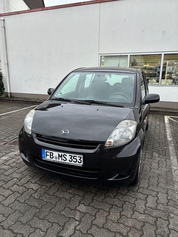 Gebraucht Daihatsu Sirion 69 PS (50 kW) 2009 Schwarz Kleinwagen