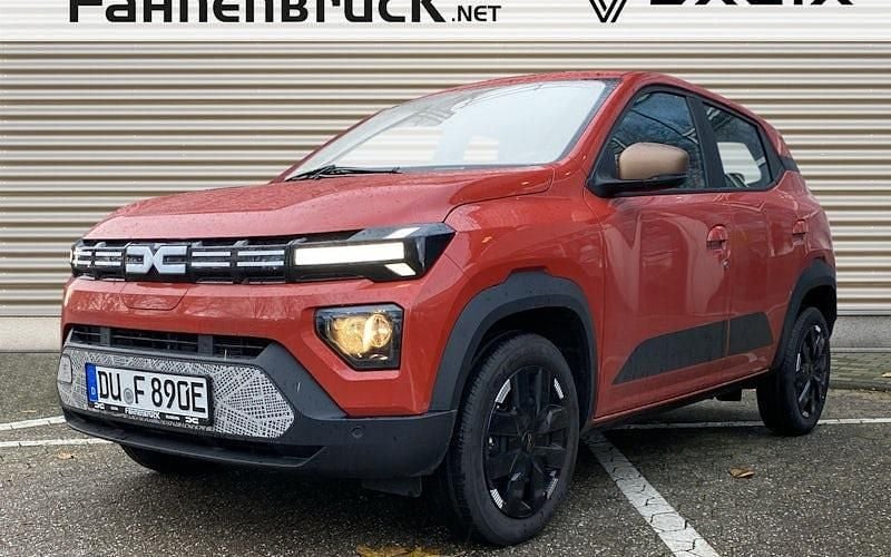 Brick red Gebraucht 2024 Dacia Spring Extreme Kleinwagen | 21.555 € (Teuer) - Bild 1/4
