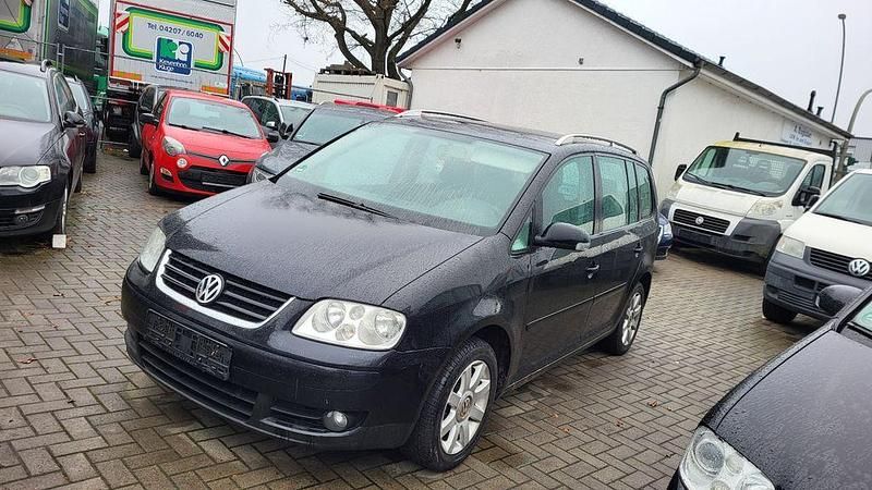 Schwarz Gebraucht 2004 VW Touran Trendline Van / Kleinbus | 1.577 € (Fairer Preis) - Bild 1/4