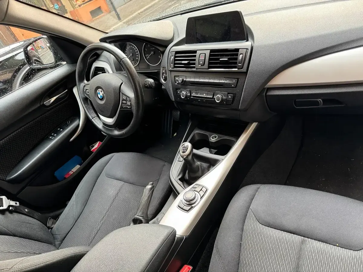 Gebraucht BMW 116 116 PS (85 kW) 2013 Schwarz Kleinwagen