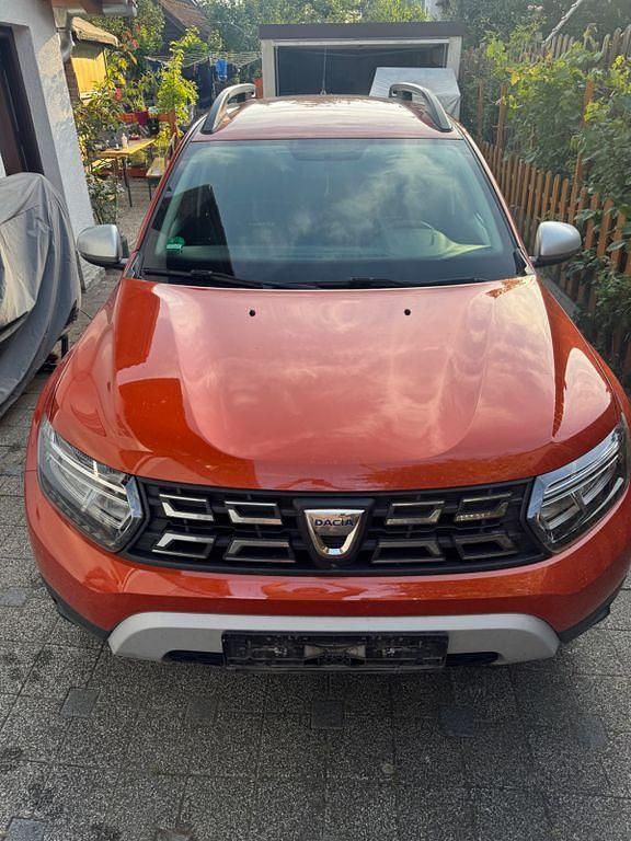Orange Gebraucht 2021 Dacia Duster Prestige SUV | 17.800 € (Fairer Preis) - Bild 1/4