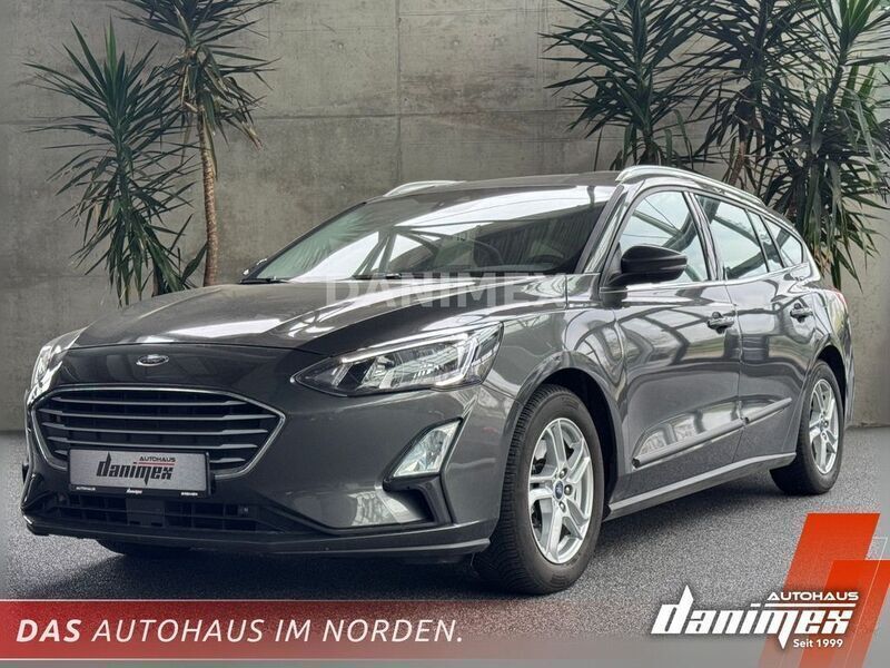 Grau Gebraucht 2019 Ford Focus Cool & Connect Limousine | 16.950 € (Fairer Preis) - Bild 1/4