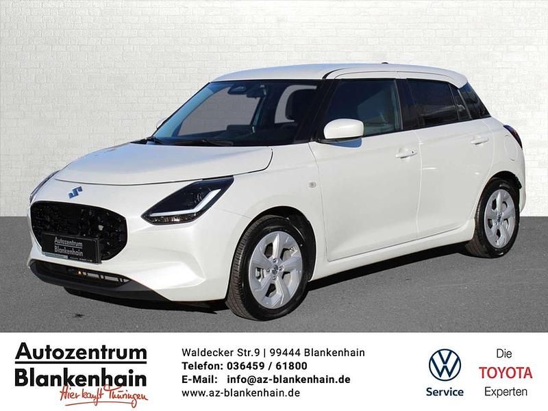Pure white pearl metallic Gebraucht 2024 Suzuki Swift Comfort Kleinwagen | 18.990 € (Fairer Preis) - Bild 1/4