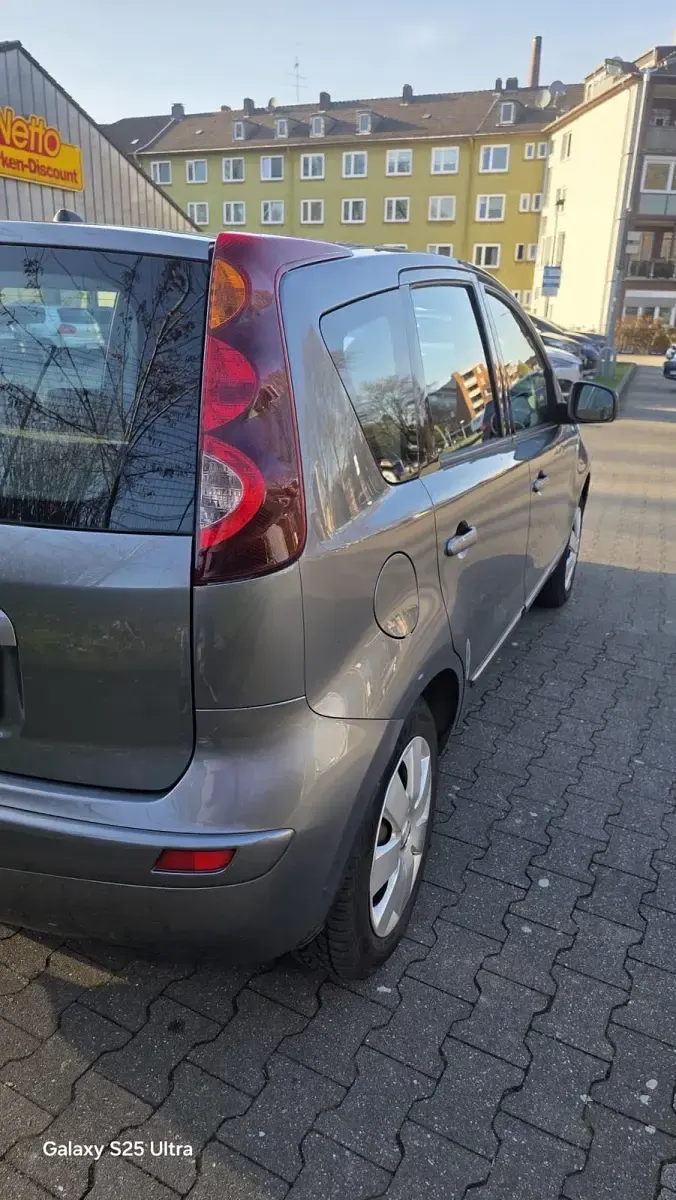 Usata Nissan Note 110 CV (80 kW) 2011 Argento Utilitaria