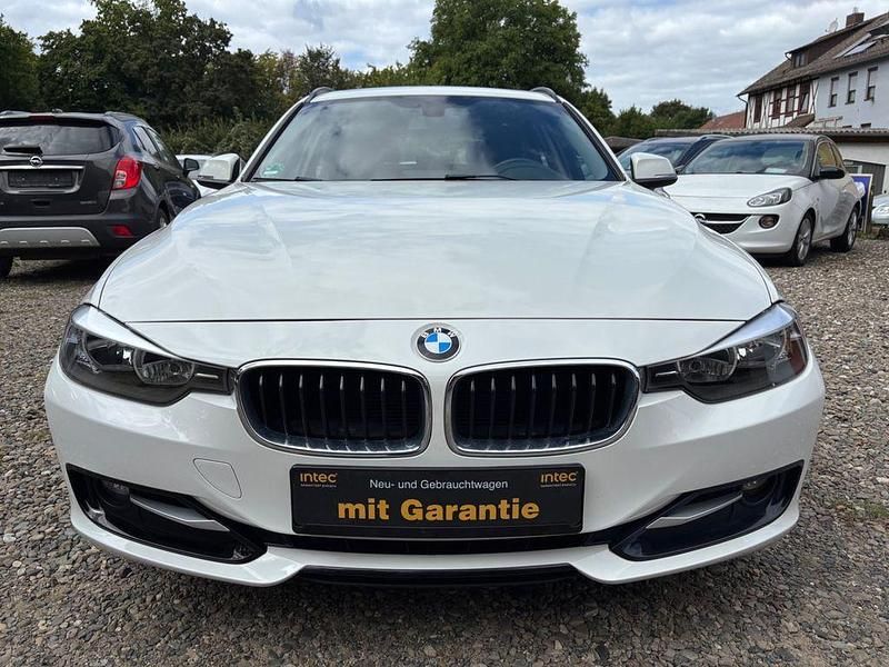 Weiß Gebraucht 2014 BMW 316 Sport Line Kombi | 10.900 € (Fairer Preis) - Bild 1/4