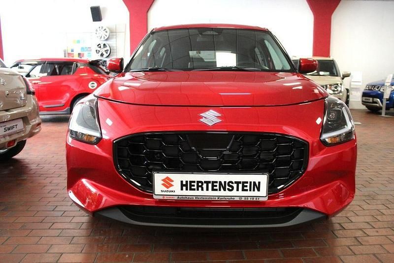 Orange Neu 2025 Suzuki Swift Comfort Limousine | 18.590 € - Bild 1/4