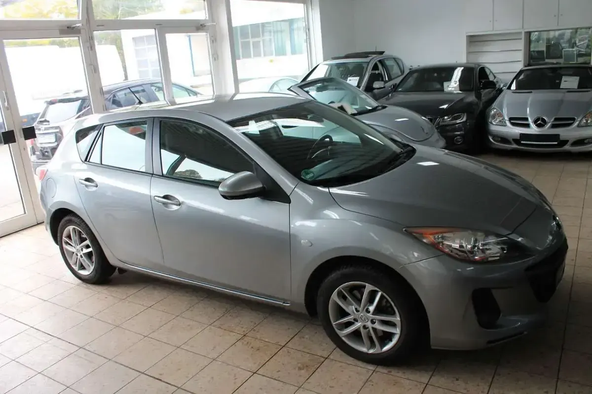 Używany Mazda 3 Edition 150 KM (110 kW) 2012 Srebrny Sedan/Limuzyna