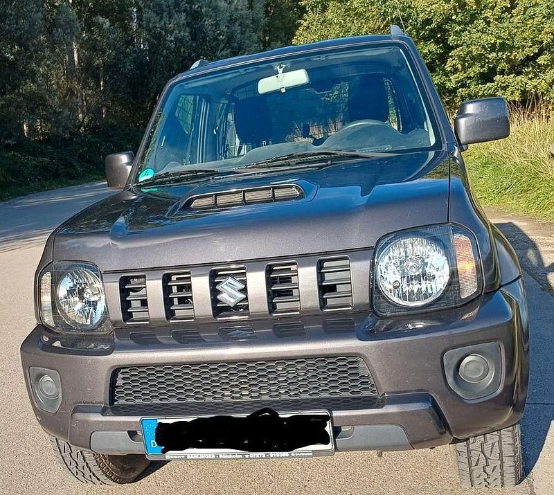 Grau Gebraucht 2018 Suzuki Jimny Style SUV | 17.500 € (Fairer Preis) - Bild 1/4