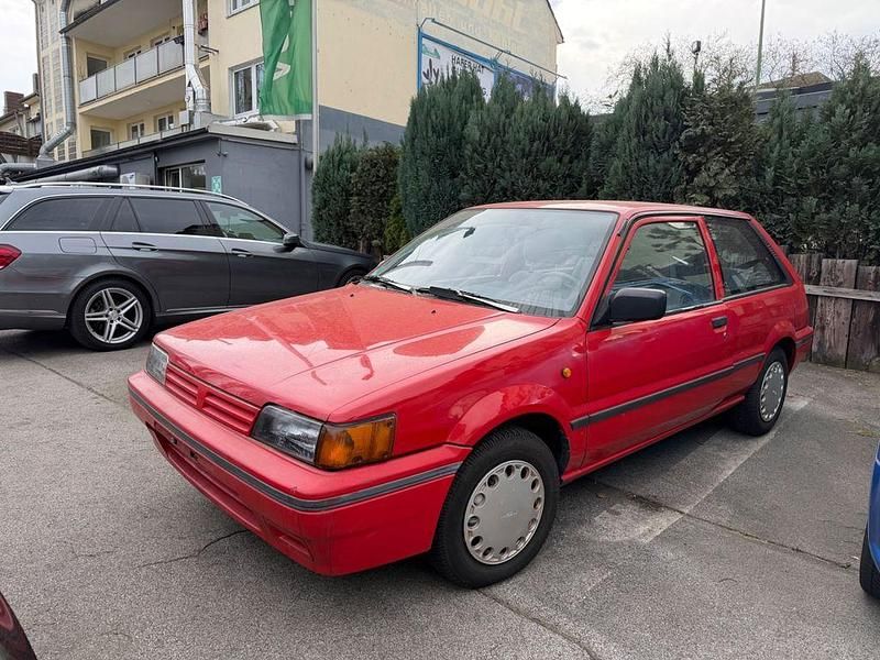 Gebraucht Nissan Sunny 90 PS (66 kW) 1990 Rot Kleinwagen