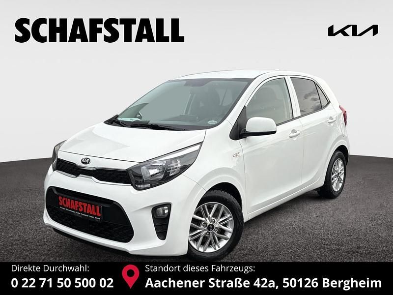 Weiss ((ud) schneeweiss) Gebraucht 2021 Kia Picanto DREAM-TEAM Edition Kleinwagen | 11.979 € (Fairer Preis) - Bild 1/3