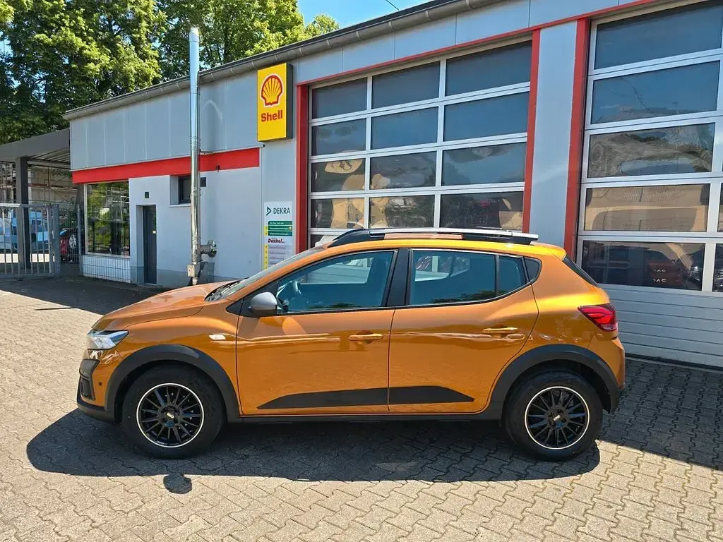 Gebraucht Dacia Sandero Expression 91 PS (66 kW) 2023 Orange Limousine