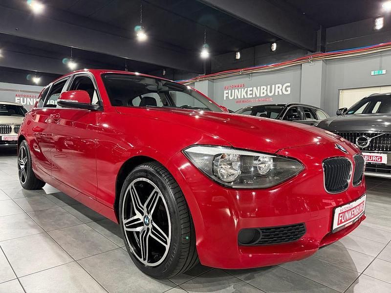 Second-hand BMW 116 116 CP (85 kW) 2013 Roșu Hatchback