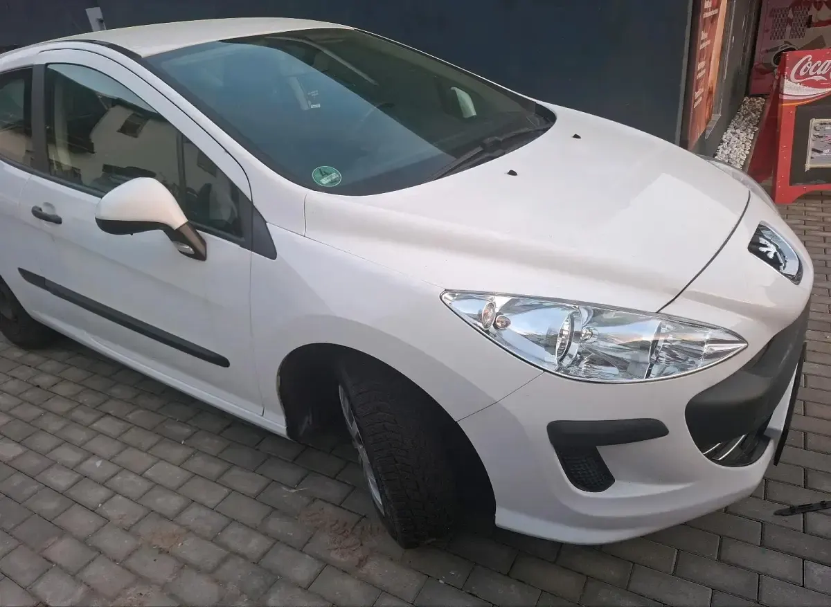 Gebraucht Peugeot 308 95 PS (69 kW) 2010 Weiß Kleinwagen