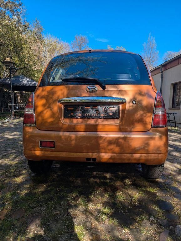 Gebraucht Daihatsu Trevis 58 PS (42 kW) 2006 Orange Kleinwagen
