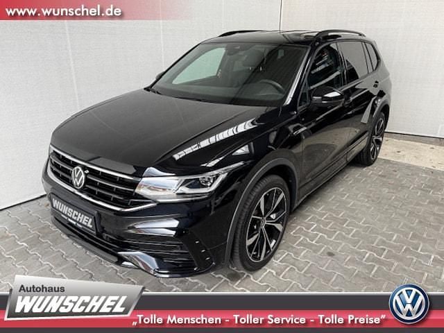 Schwarz Gebraucht 2024 VW Tiguan Allspace R-line SUV | 52.790 € - Bild 1/4