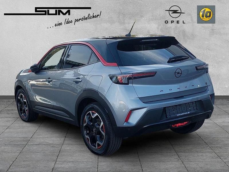 Gebraucht Opel Mokka-e GS Line 100 kW (136 PS) 2022 Kontrast grau/quarz silber SUV