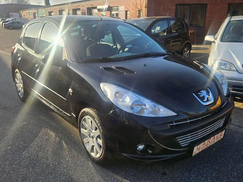 Schwarz perla nera/metallic Gebraucht 2009 Peugeot 206 Basis Limousine | 3.999 € - Bild 1/4
