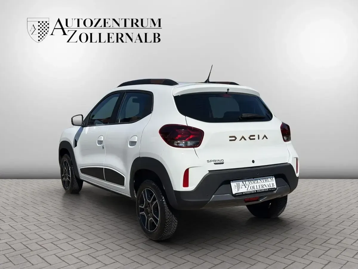 Gebraucht Dacia Spring Extreme 66 kW (90 PS) 2023 Weiß Kleinwagen