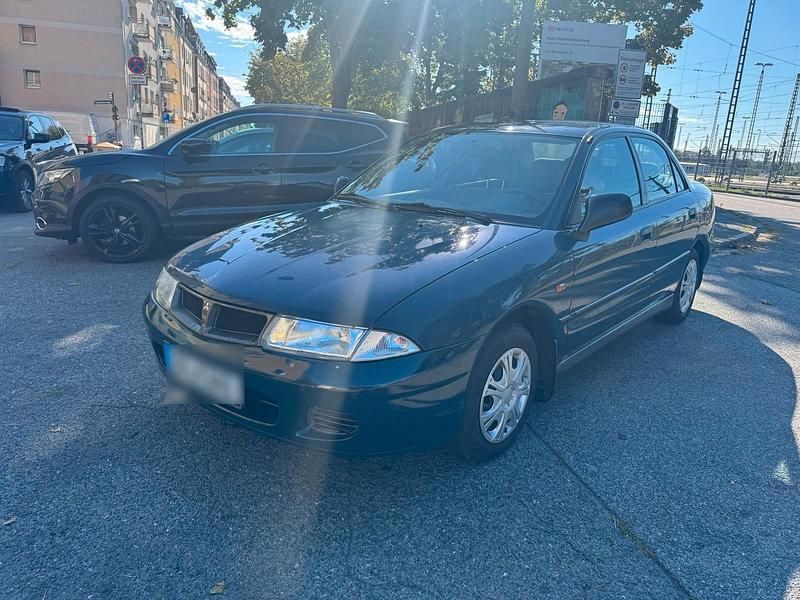 Grün Gebraucht 1997 Mitsubishi Carisma Limousine | 850 € - Bild 1/4