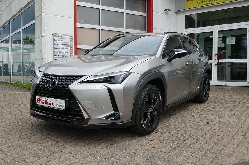 Sonic titanium Gebraucht 2024 Lexus UX 250h Executive Line SUV | 34.900 € (Fairer Preis) - Bild 1/4