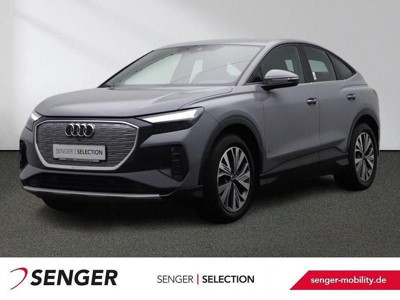 Kieselgrau Gebraucht 2022 Audi Q4 Sportback e-tron Sport SUV | 30.990 € (Etwas zu teuer) - Bild 1/4