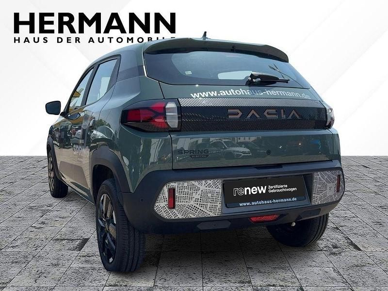 Gebraucht Dacia Spring Extreme 47 kW (65 PS) 2024 Olivgrün (grün) Kleinwagen