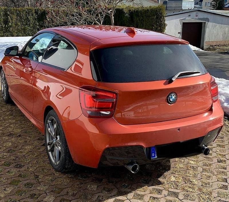 Usata BMW M135 Performance 320 CV (235 kW) 2013 Arancione Utilitaria