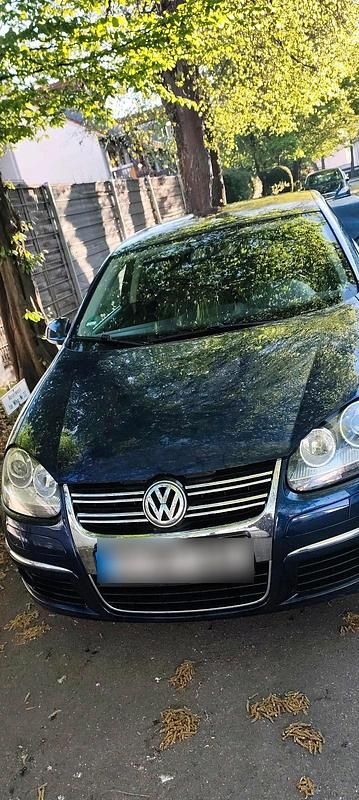 Second-hand VW Jetta 105 CP (77 kW) 2007 Albastru Berlinǎ