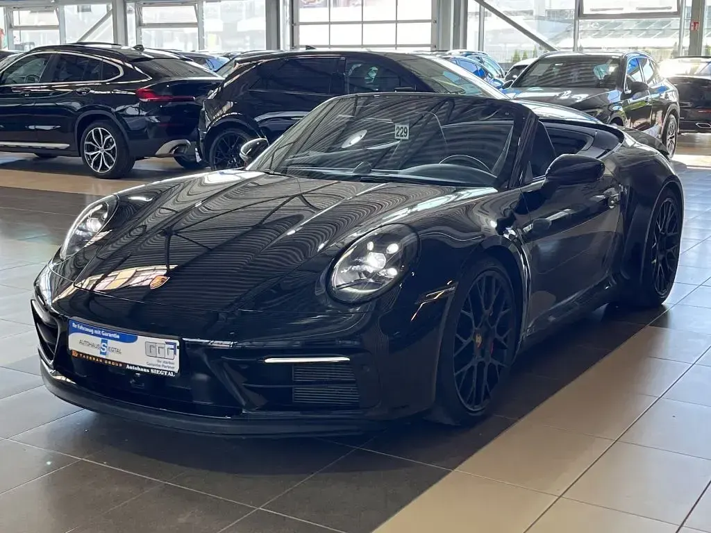 Gebraucht Porsche 911 480 PS (353 kW) 2023 Schwarz tiefschwarzmetallic (metallic) Cabrio