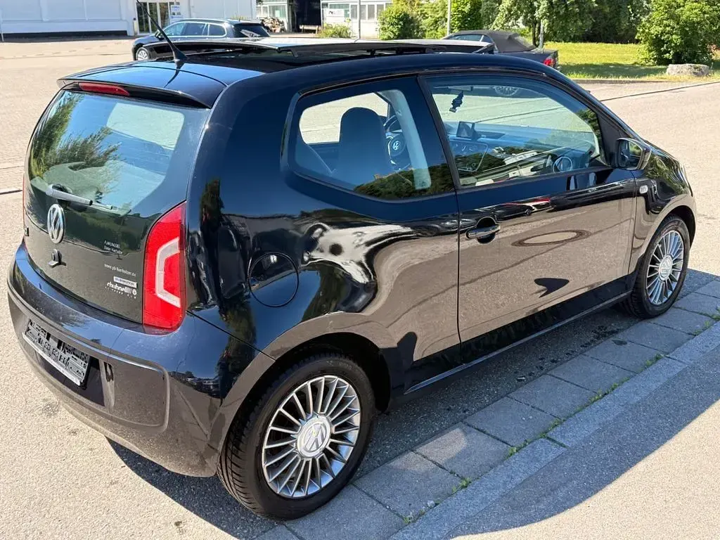 Usado VW up! 75 CV (55 kW) 2012 Negro Utilitario