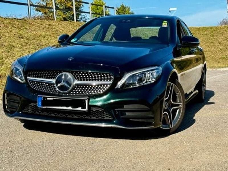 Grün Gebraucht 2019 Mercedes C180 AMG line Limousine | 21.799 € - Bild 1/4