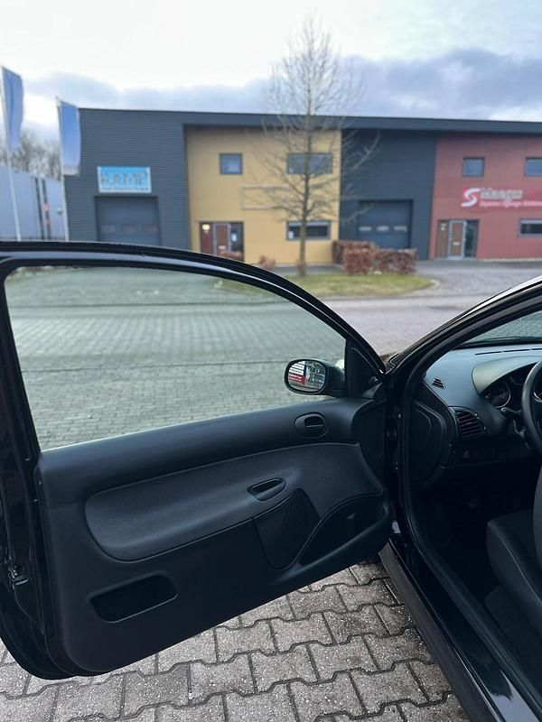 Gebraucht Peugeot 206+ 68 PS (50 kW) 2011 Schwarz Kleinwagen