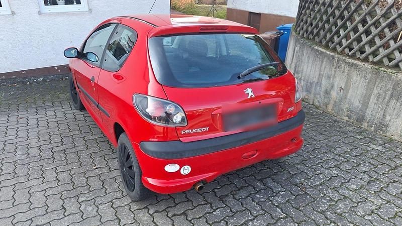 Gebraucht Peugeot 206 75 PS (55 kW) 2007 Rot Kleinwagen