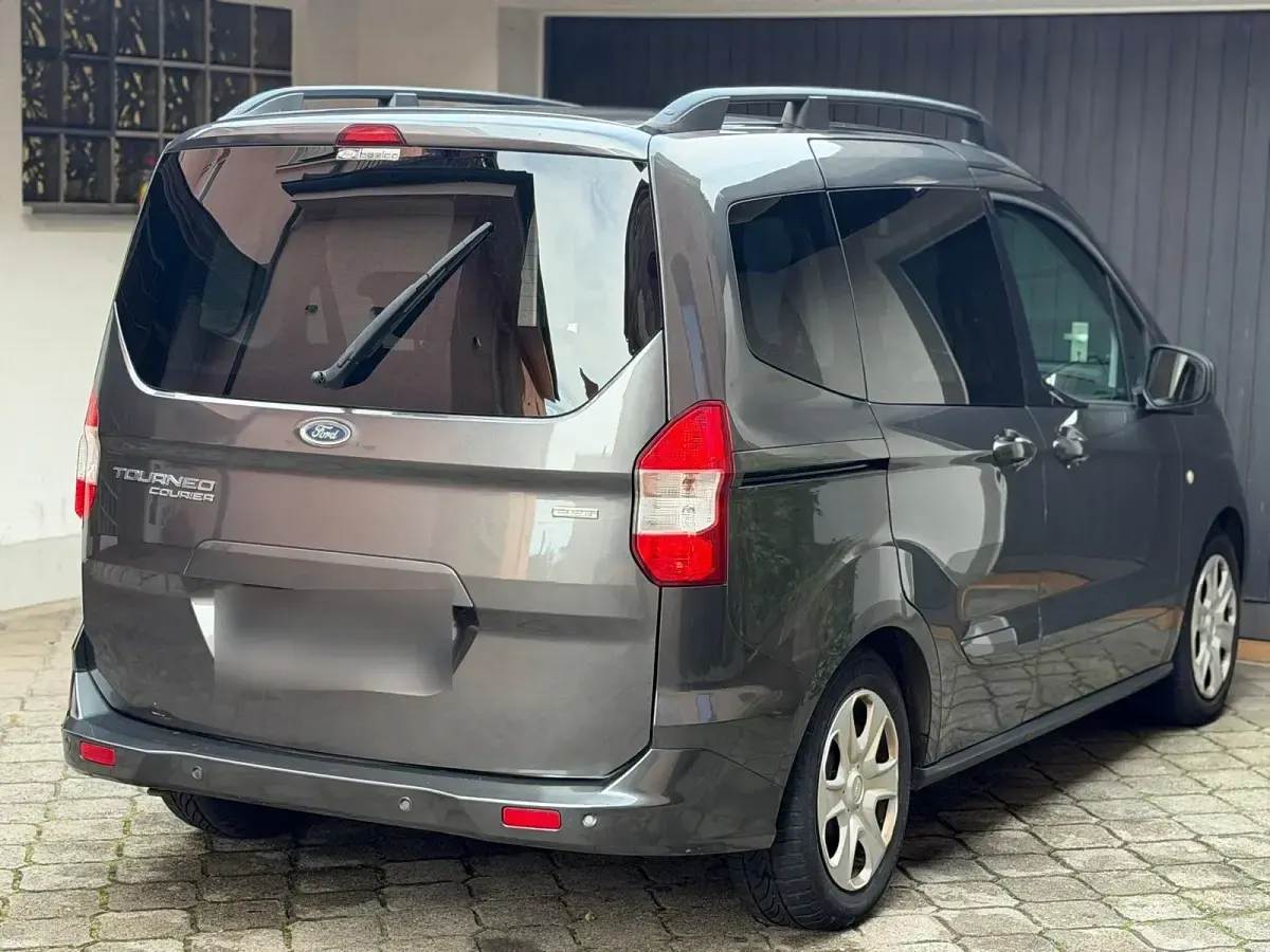 Gebraucht Ford Tourneo Courier 101 PS (74 kW) 2015 Grau Van / Kleinbus