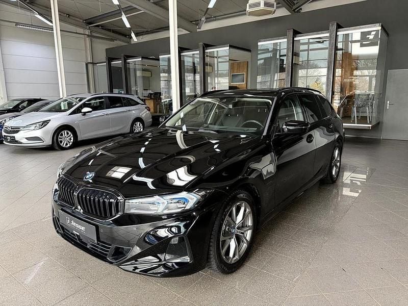 Gebraucht BMW 320e Sport Line 204 PS (150 kW) 2024 Schwarz Kombi