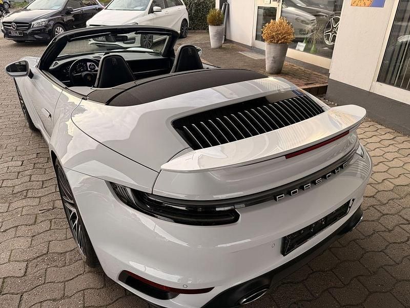 Gebraucht Porsche 992 581 PS (427 kW) 2021 Carraweißmetallic Cabrio