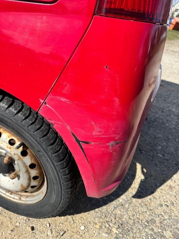 Gebraucht Daihatsu Cuore 58 PS (42 kW) 2003 Rot Kleinwagen