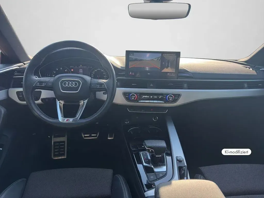 Gebraucht Audi A5 Sportback Business 204 PS (150 kW) 2023 Tangorot metallic Kleinwagen