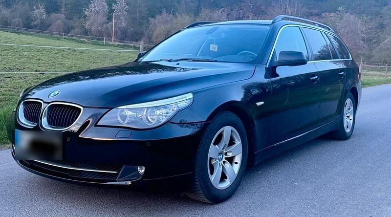 Second-hand BMW 520 163 CP (119 kW) 2010 Negru Break