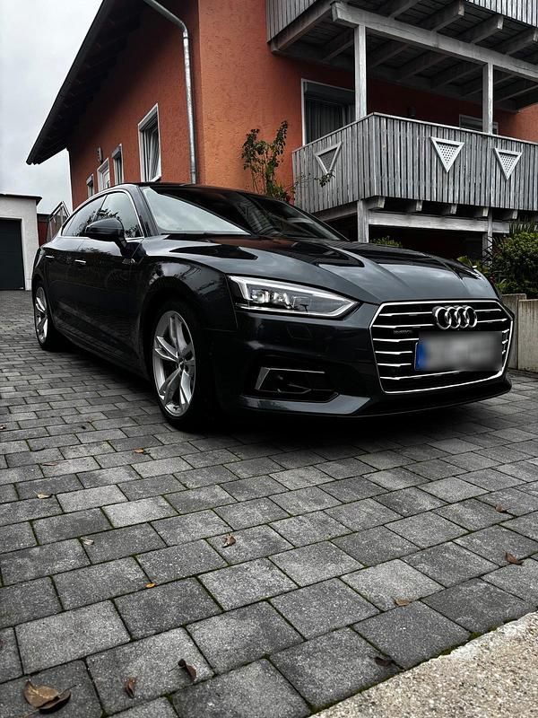 Grau Gebraucht 2018 Audi A5 Ambiente Coupé | 23.780 € (Superpreis) - Bild 1/4