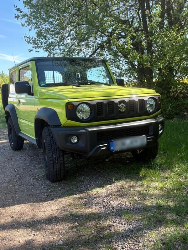 Gelb Gebraucht 2023 Suzuki Jimny Comfort SUV | 28.000 € (Fairer Preis) - Bild 1/4
