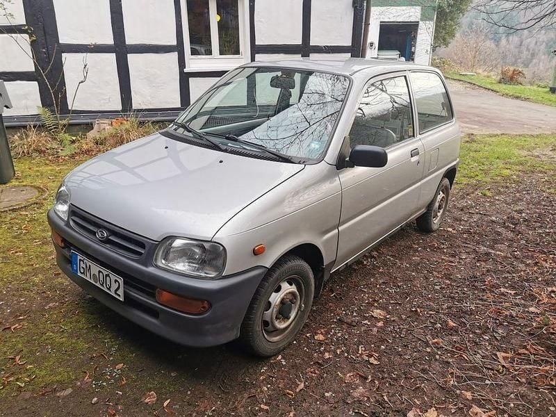 Silber Gebraucht 1998 Daihatsu Cuore Kleinwagen | 1.350 € - Bild 1/4