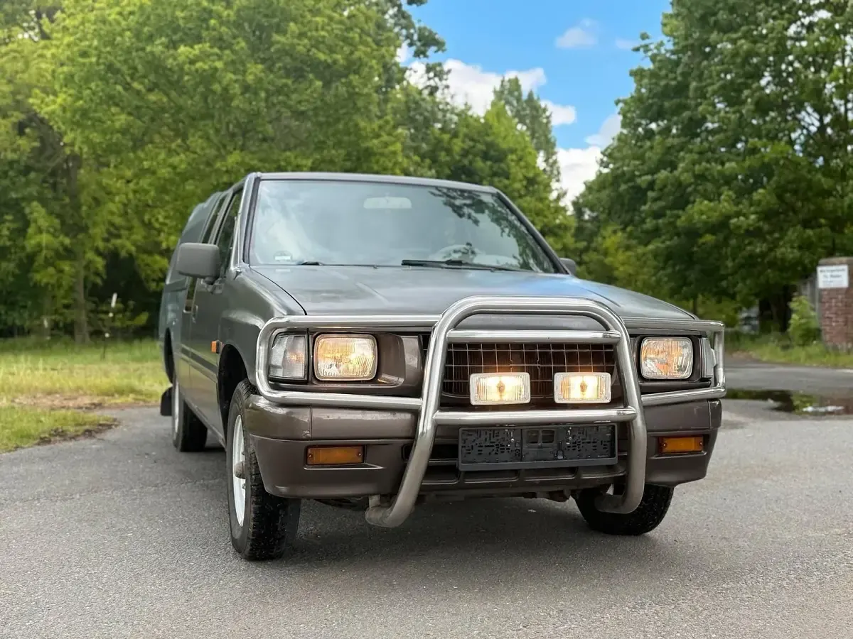 Używany Opel Campo 98 KM (72 kW) 1995 Szary Pickup