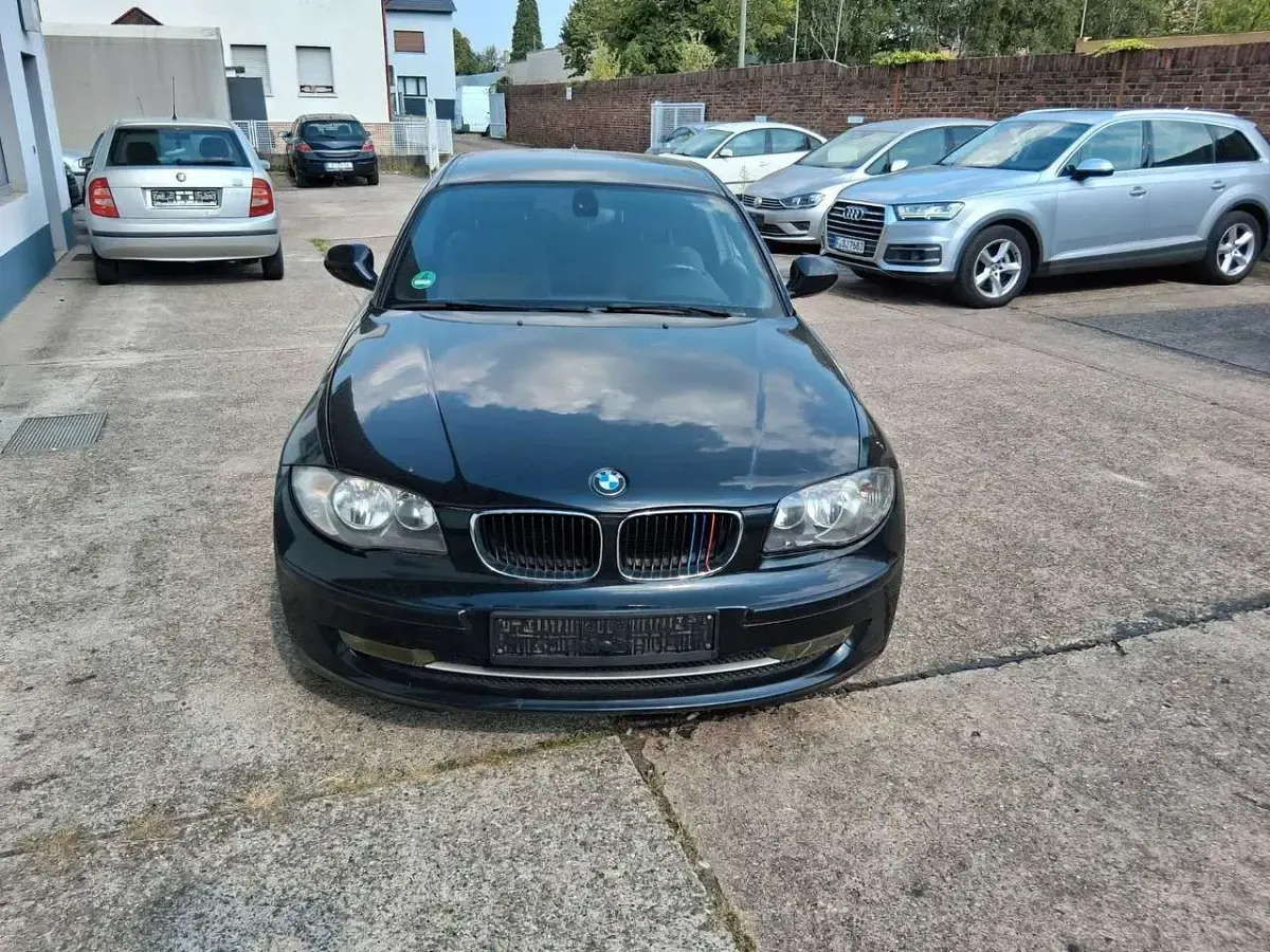Używany BMW 116 Performance 122 KM (89 kW) 2010 Czarny Hatchback